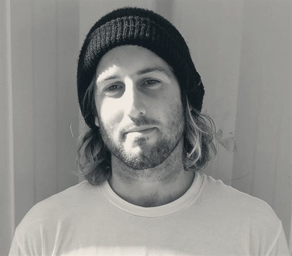 Justin Quintal in a beanie, portrait